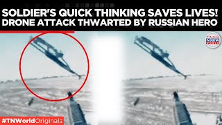 Watch  Incredible Moment Russian Soldier Deflects Ukrainian Drone with Machine Gun  TN World [upl. by Adnir]