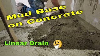 How to prep and install a mud base for a linear drain over an uneven concrete floor [upl. by Elamef468]