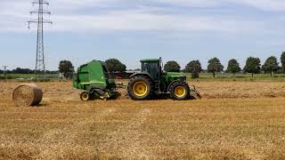 JohnDeere 7710 mit JohnDeere 592 Presse [upl. by Aneerol820]