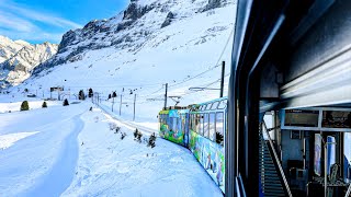 Riding a train in the Swiss Alps in winter ❄️ Grindelwald 4K 🇨🇭 [upl. by Lipinski824]