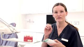 How to clean between your teeth using an air flosser [upl. by Verine436]