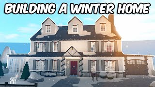 BUILDING A WINTER HOME IN BLOXBURG [upl. by Aleinad]