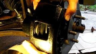 The Stuck Brake Caliper Adventure part 1 Replacing the caliper rotor and pads [upl. by Romo]