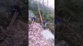 The process of unloading bricks down the hillside [upl. by Agnot]