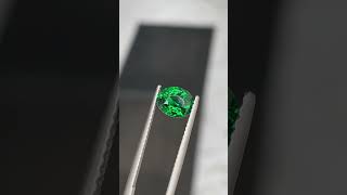 The Secret Behind This Glowing Green Gemstone shorts shortsvideo gemstone emerald fyp [upl. by Hwang]