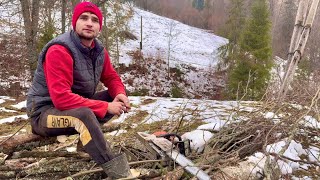 A young mans hard working day in the mountains Harvesting firewood for the winter [upl. by Nissa]