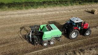 Massey Ferguson 8130 pulling a DeutzFahr MP 135 Balepack [upl. by Hadeis]