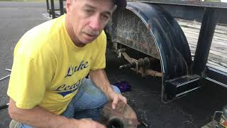 Grease bearings on utility trailer [upl. by Hibben]