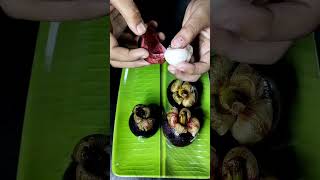 first time trying mangosteen🍑🤤mangosteen yummyfoodie trendingshorts [upl. by Nava]