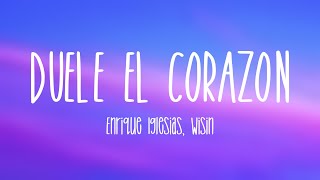 DUELE EL CORAZON  Enrique Iglesias Wisin Lyrics Video [upl. by Ysabel]