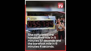 Melinder sets new fastest mile in handcuffs and on barefoot Guinness World Records [upl. by Llesram]