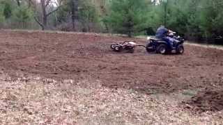 Howse ATV disc harrow in action [upl. by Okihcim]