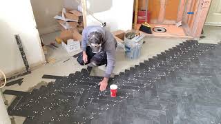 Herringbone Tile Floor Time lapse Install [upl. by Ssew988]