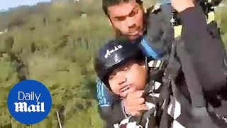 Hero pilot saves man after their paraglider SNAPS mid air [upl. by Aneert563]