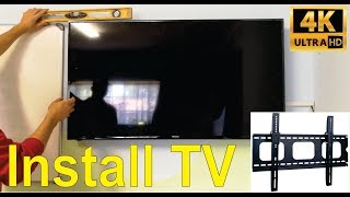 How to install a TV onto a wall with a bracket and lay trunking Step by step [upl. by Llewol]