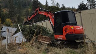 Final cleanup on the trash property with the Kubota KX 040 4 [upl. by Asilav]