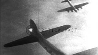 A burning American B17 aircraft falls through clouds in Germany HD Stock Footage [upl. by Alah4]