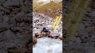 Man drinking glacier melt water in mountain place amazing view stunning place enjoying place [upl. by Houser226]