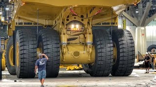 Moving a massive Caterpillar 794AC dump truck [upl. by Nosduj882]