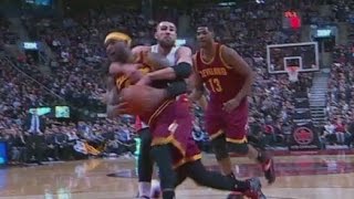 LeBron James tackled by Jonas Valanciunas Cavaliers at Raptors [upl. by Dennison]