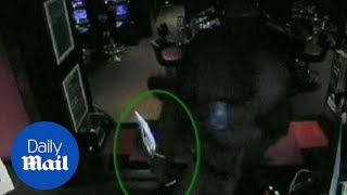 Terrifying moment masked robbers with machetes attack casino  Daily Mail [upl. by Adamsun]