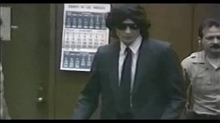 Richard Ramirez wearing a fancy suit in court  sticking tongue out no sound [upl. by Lavella]