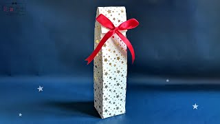 How to wrap a bottle as gift with wrapping paper  Gift wrapping ideas for wine bottle [upl. by Ayra]