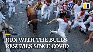 Spain’s annual running of the bulls resumes after 2 years since Covid pandemic with 3 gored so far [upl. by Notak395]