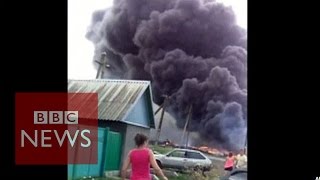 MH17 New footage shows crash aftermath  BBC [upl. by Onirefez]