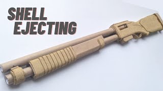 Shell ejecting cardboard shotgun with magazine  how to make cardboard gun [upl. by Eniagrom93]