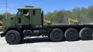 Oshkosh M1070 24 ft Flat Bed 8x8 truck CampC Equipment [upl. by Suravat]