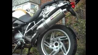 BMW R1200 GS standard exhaust change to an Akrapovic racing line slip on [upl. by Araiet]