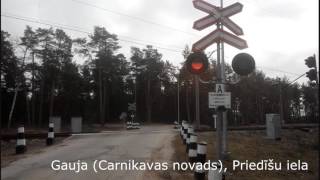 Railroad crossing in Latvia Gauja Carnikavas novads Priedišu iela [upl. by Zetnom888]