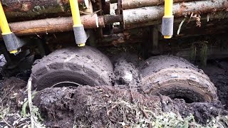 Valtra T144 with large trailer Kronos 160 4WDM logging in wet forest stuck in the mud [upl. by Adrianne]