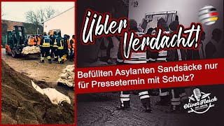 Ungeheuerlicher Verdacht Befüllten „Flüchtlinge“ Sandsäcke nur für eine Show mit Kanzler Scholz [upl. by Eerized]