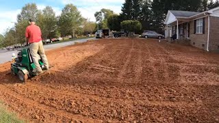 Regrading and seeding a residential yard [upl. by Ellehctim911]