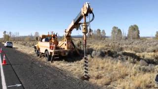 Drilling post holes for new speed signs [upl. by Atteuqal]