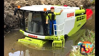 BRUDER MUD COMBINE Harvester CLAAS LEXION 780  Kids videos [upl. by Gersham]