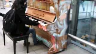 Girl playing the piano at St Pancras station [upl. by Eustache]