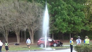 Two car collision knocks fire hydrant out and sends water shooting into the air [upl. by Ayote]