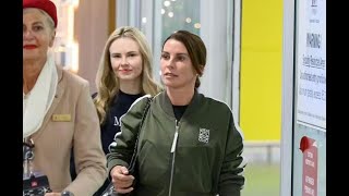 Coleen Rooney touches down in Australia with special item as good luck charm [upl. by Hatfield480]