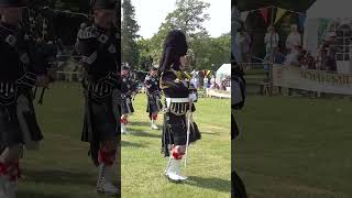 Drum Majors lead the Lonach pipeband marching into the 2023 Oldmeldrum highlandgames shorts [upl. by Marillin]