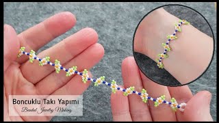 Çiçek zincir bileklik yapımı Flower chain bracelet making for beginners Beaded bracelet tutorial [upl. by Annazor]