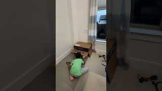 Kid docking ILife in Robot Vacuum cleaner garage  Part 2 [upl. by Thorstein]