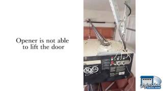 Garage Door Makes a Sound But Won’t Open [upl. by Grosmark]