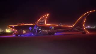 Another lovely video of the iconic shark art car cruising across the Playa at burning man 2024 [upl. by Alie296]