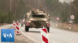 Hundreds of German Soldiers Military Vehicles Arrive at Lithuanian NATO Base [upl. by Evanthe]