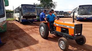 Trator caseiro com motor de moto puxando um ônibus [upl. by Gnod]