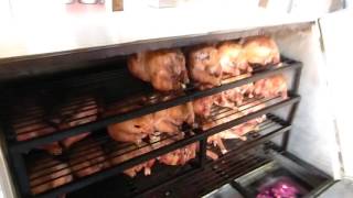 A heavy duty Cookswell charcoal oven roasting 24 whole chickens in Bomet [upl. by Savory]