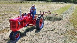 Raking Hay with the Farmall Super C [upl. by Hapte]